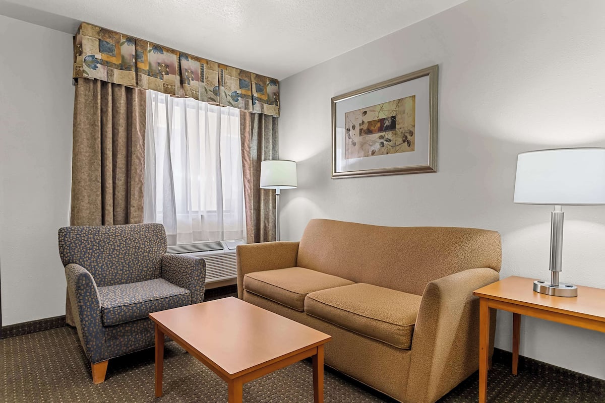 family suite, 1 king bed, non smoking, microwave (no pets in room type) | in-room safe, desk, iron/ironing board, wifi