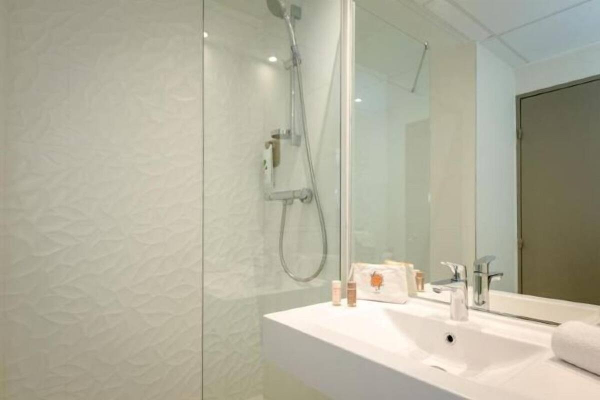 Bathroom | Shower, eco-friendly toiletries, hair dryer, towels