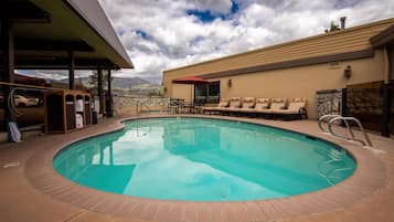 Seasonal outdoor pool, pool loungers