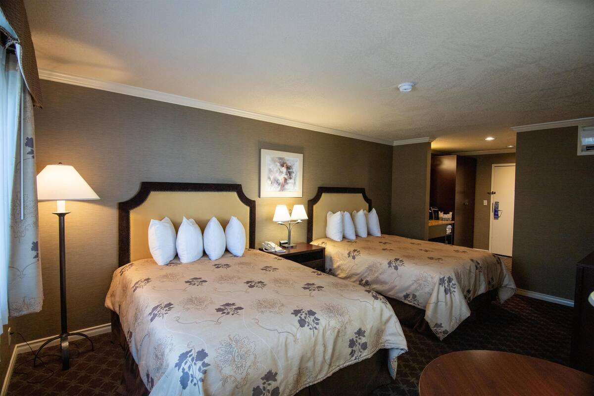 Deluxe Room, 2 Queen Beds, Non Smoking, Patio (Pet Friendly) | Iron/ironing board, free WiFi, bed sheets