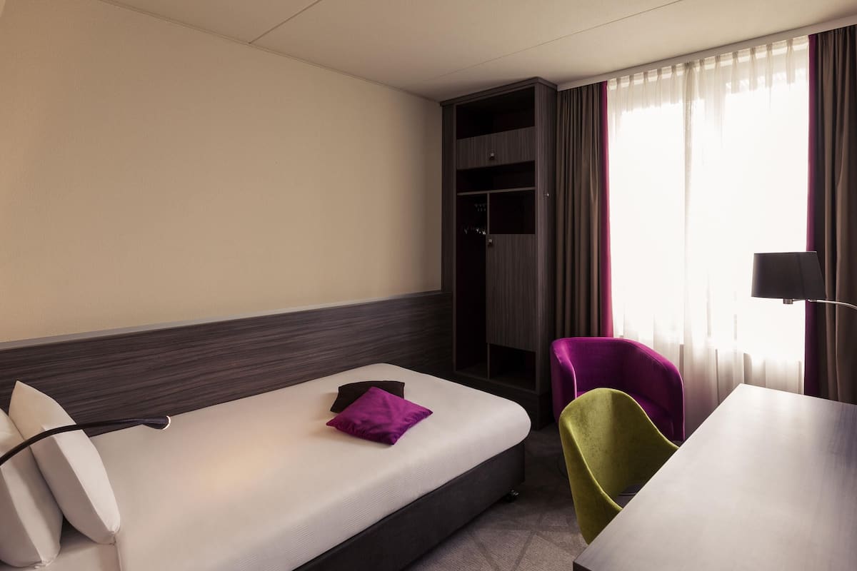 Standaard kamer, 1 eenpersoonsbed | Een minibar, een kluis op de kamer, een bureau