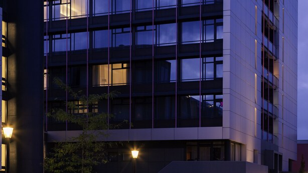 A modern building with a 'Mercure' sign at the top.