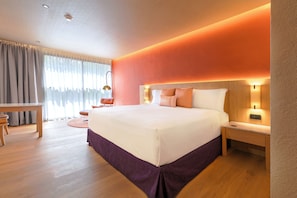 Deluxe Plus King | Premium bedding, minibar, in-room safe, desk