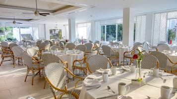 Breakfast, lunch, dinner served; international cuisine, pool views