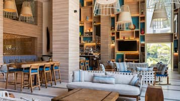 Breakfast, lunch, dinner served; international cuisine, pool views