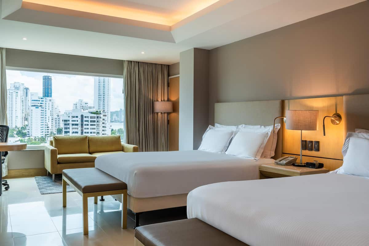 Executive Room, 2 Queen Beds | Living area | 49-inch LCD TV with cable channels, TV, MP3 dock