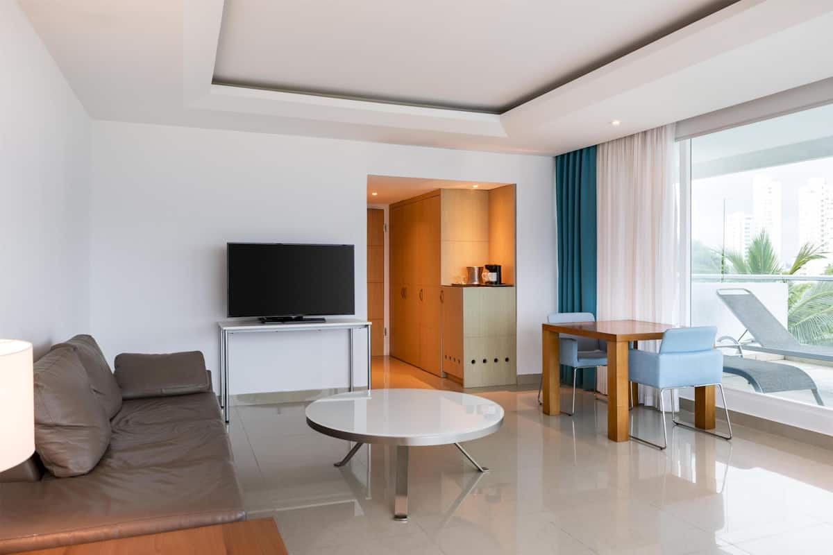 Suite, 1 King Bed (Parlor) | Living area | 49-inch LCD TV with cable channels, TV, MP3 dock