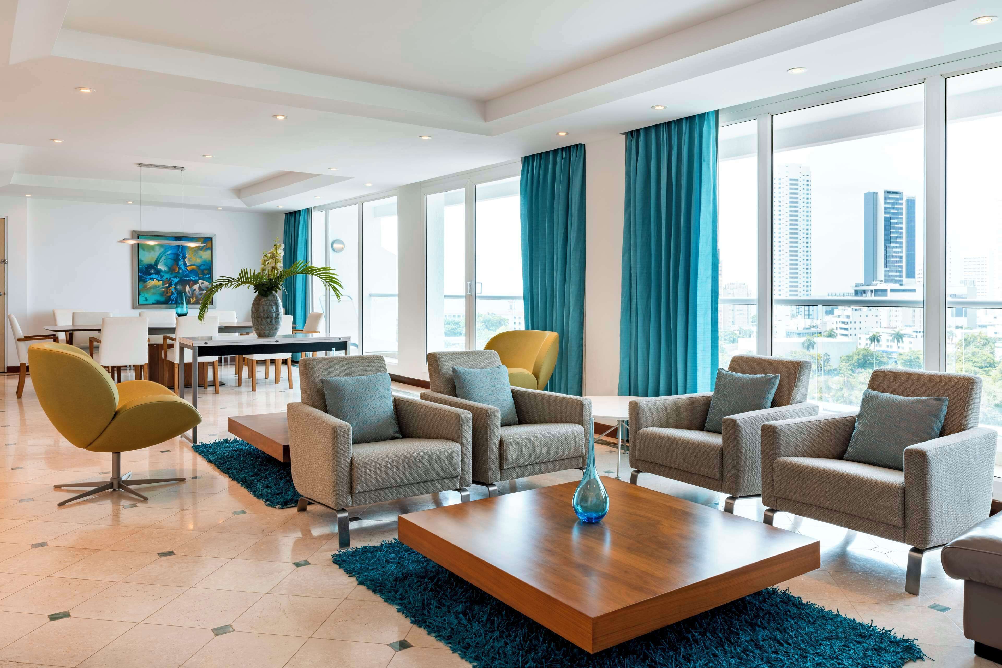 Presidential Suite, 1 King Bed | Living area | 49-inch LCD TV with cable channels, TV, MP3 dock