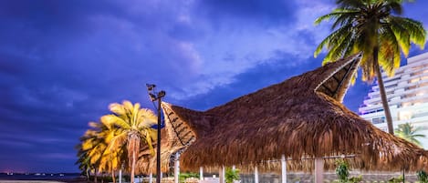 Beach nearby, black sand, sun-loungers, beach umbrellas