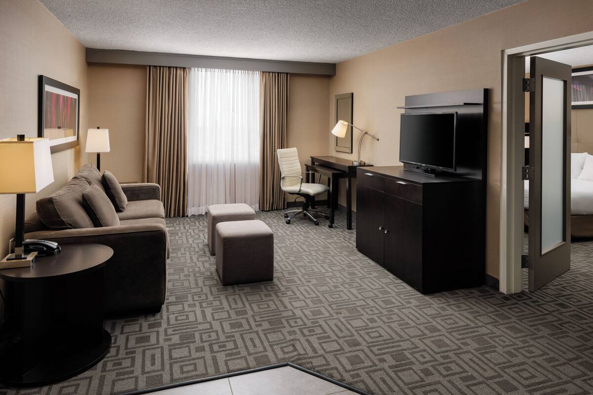 Executive Studio, Jetted Tub | Living area | 42-inch flat-screen TV with digital channels, TV