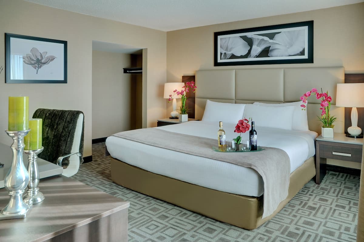 premium bedding, pillow-top beds, desk, laptop workspace