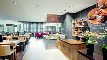 3 restaurants, breakfast, lunch, dinner served; international cuisine