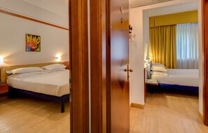 Family Room, 2 Queen Beds, Non Smoking, Connecting Rooms | Minibar, desk, blackout curtains, soundproofing