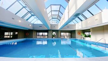 Indoor pool, open 9:00 AM to 9:00 PM, sun loungers, lifeguards on site