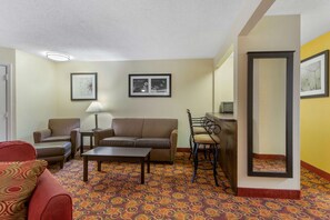 Suite, Multiple Beds, Non Smoking, Jetted Tub (with Sofabed) | In-room safe, desk, laptop workspace, iron/ironing board