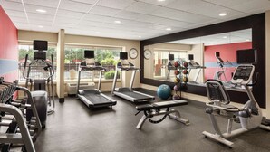 A gym with treadmills, elliptical machines, and a rowing machine. - Hampton Inn Atlanta Stone Mountain (Stone Mountain)