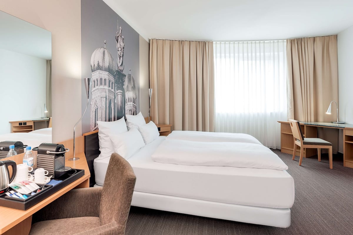 Premium bedding, memory-foam beds, minibar, in-room safe