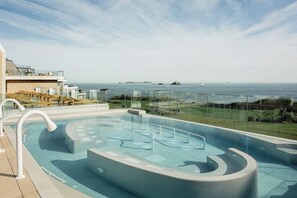 2 indoor pools, open 8:00 AM to 8:00 PM, lifeguards on site
