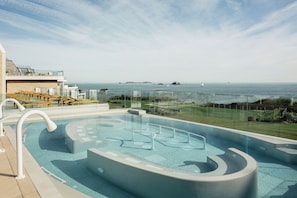2 indoor pools, open 8:00 AM to 8:00 PM, lifeguards on site