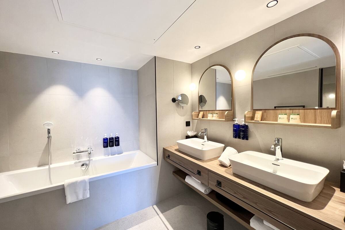 eco-friendly toiletries, hair dryer, bathrobes, towels