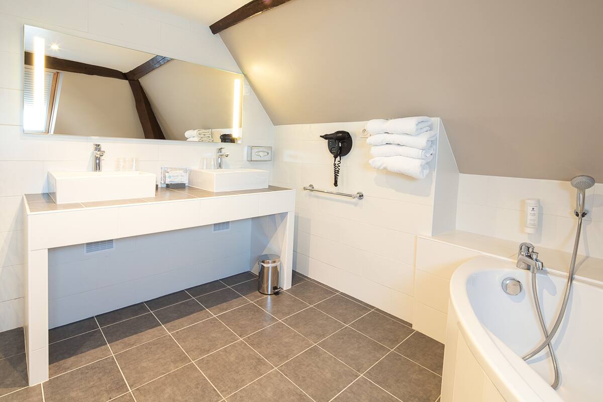 family room, multiple beds, non smoking (larger room) | bathroom | hair dryer, towels