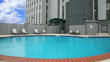 Outdoor pool, open 9:00 AM to 10:00 PM, pool loungers