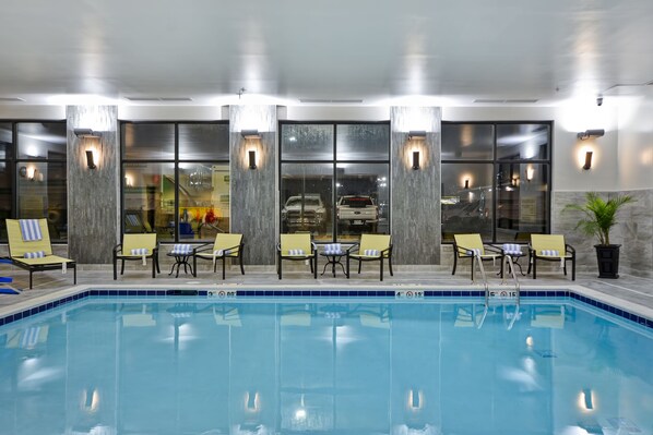 Indoor pool, open 9:00 AM to 10:00 PM, pool loungers