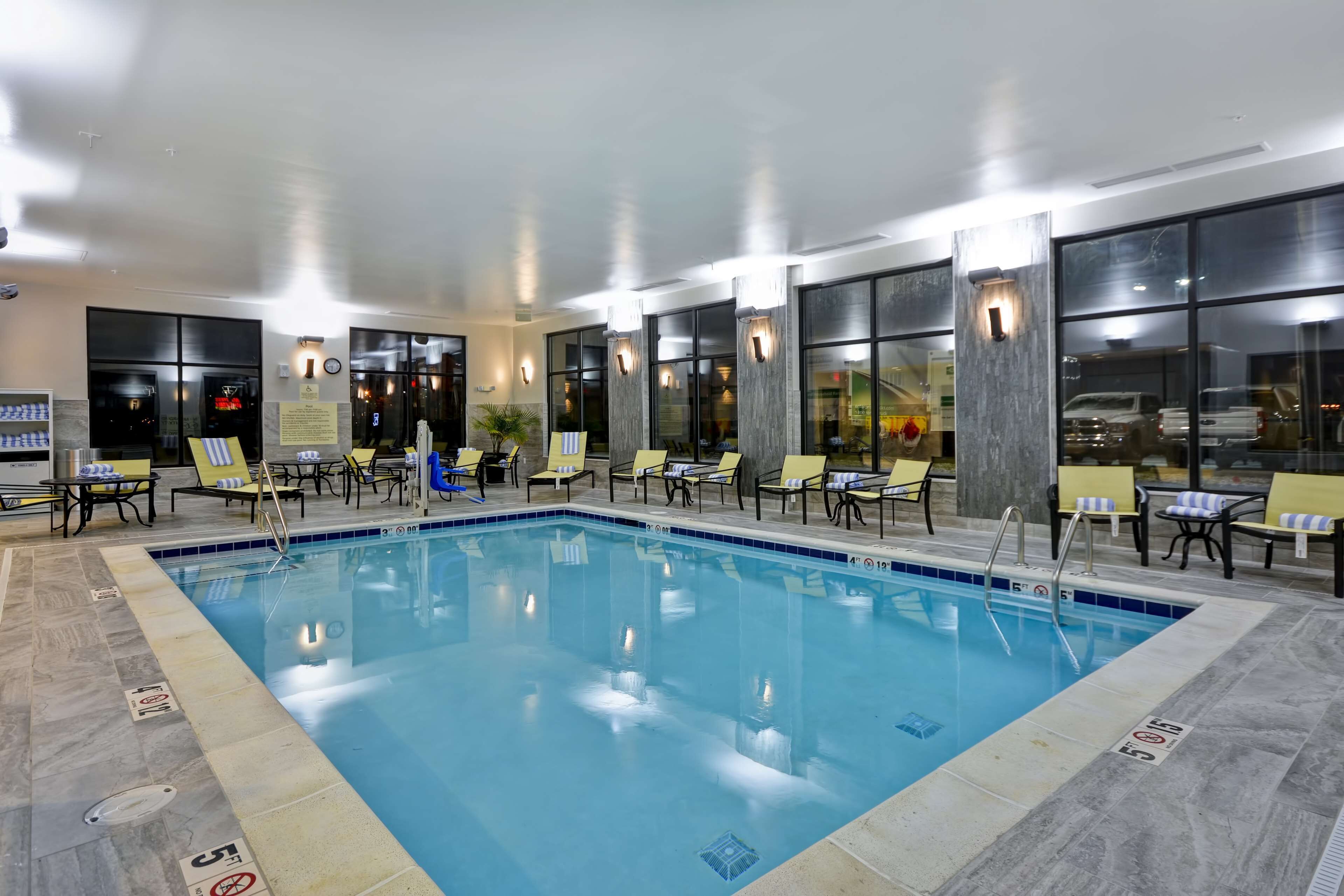 indoor pool, open 9:00 am to 10:00 pm, pool loungers