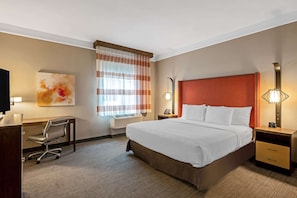 Room, 1 King Bed, Non Smoking | Pillow-top beds, desk, laptop workspace, blackout curtains
