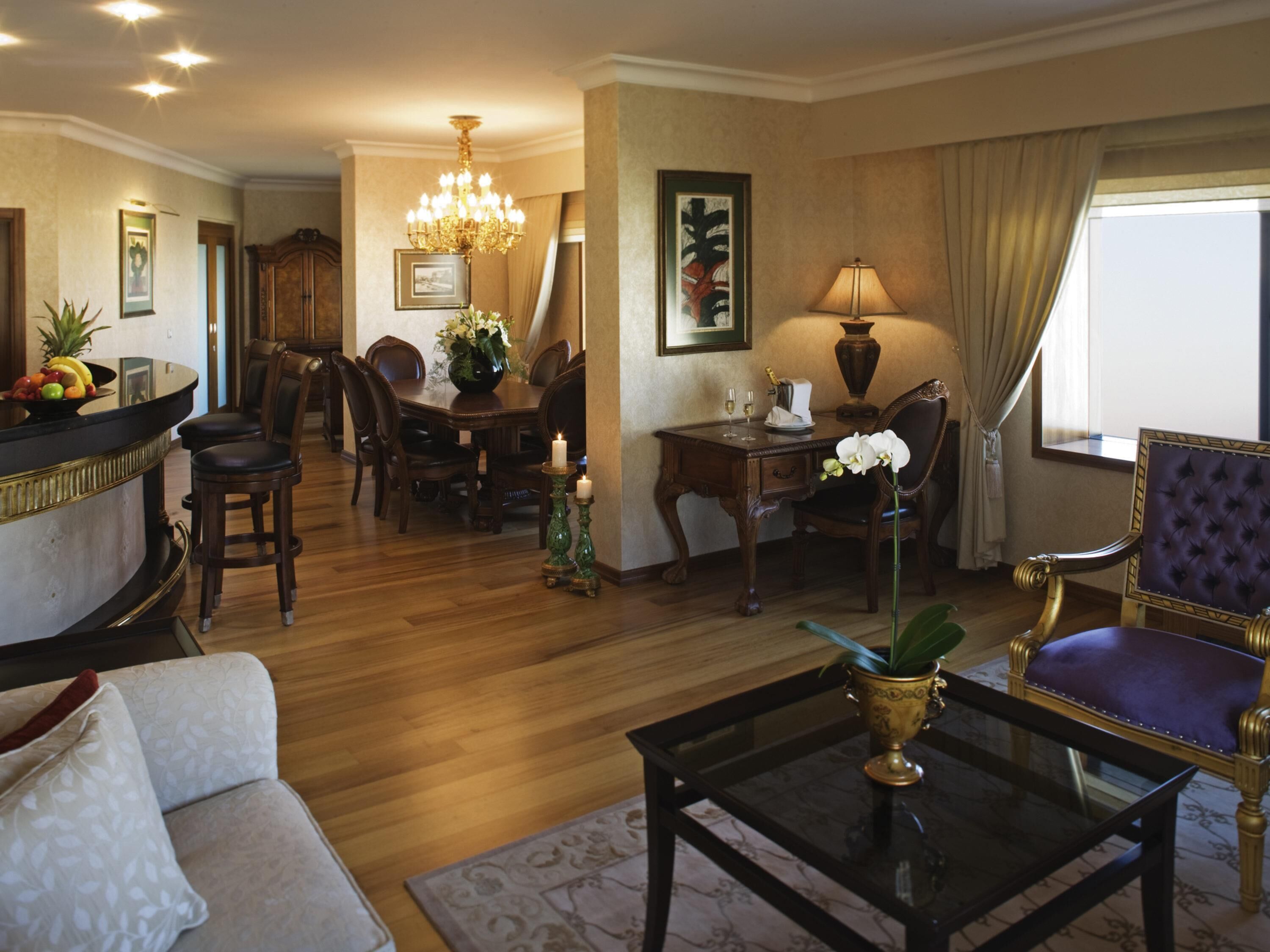 Suite, 1 King Bed, Sea View | Minibar, in-room safe, desk, laptop workspace