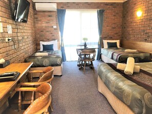 Family Room | Pillowtop beds, free minibar, desk, soundproofing