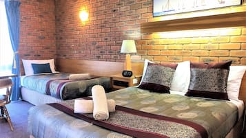 Family Room | Pillow-top beds, free minibar, desk, soundproofing