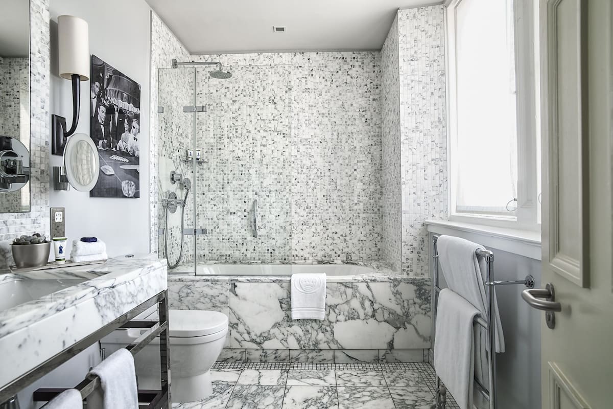 shower, designer toiletries, hair dryer, bathrobes