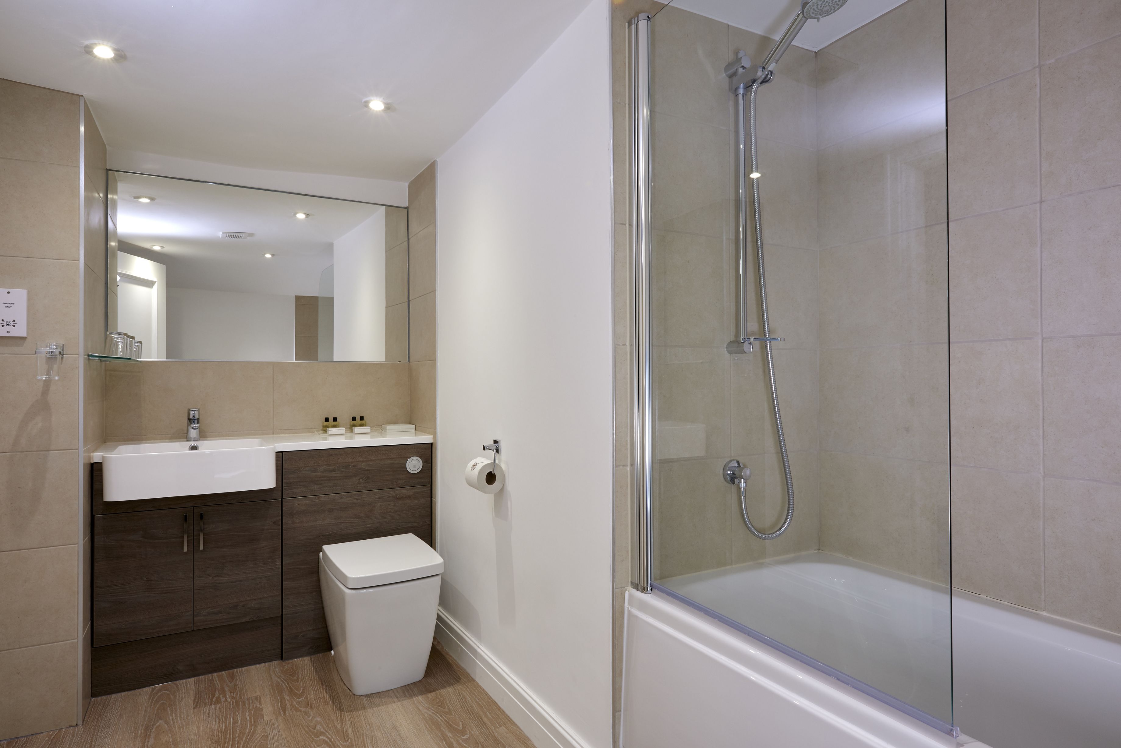 combined shower/bathtub, free toiletries, hair dryer, towels