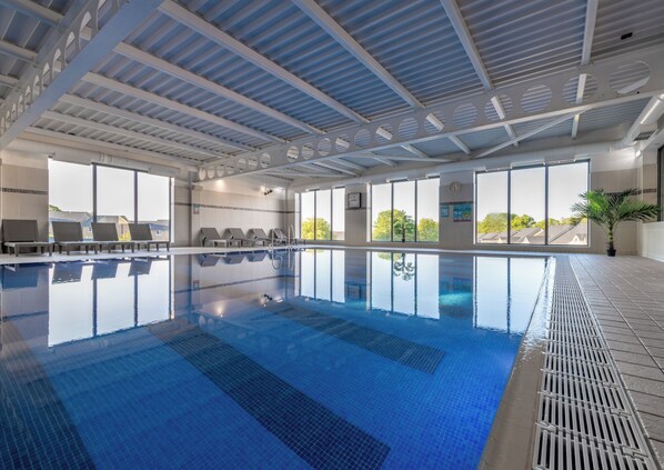 Indoor pool, open 7:00 AM to 9:30 PM, sun loungers