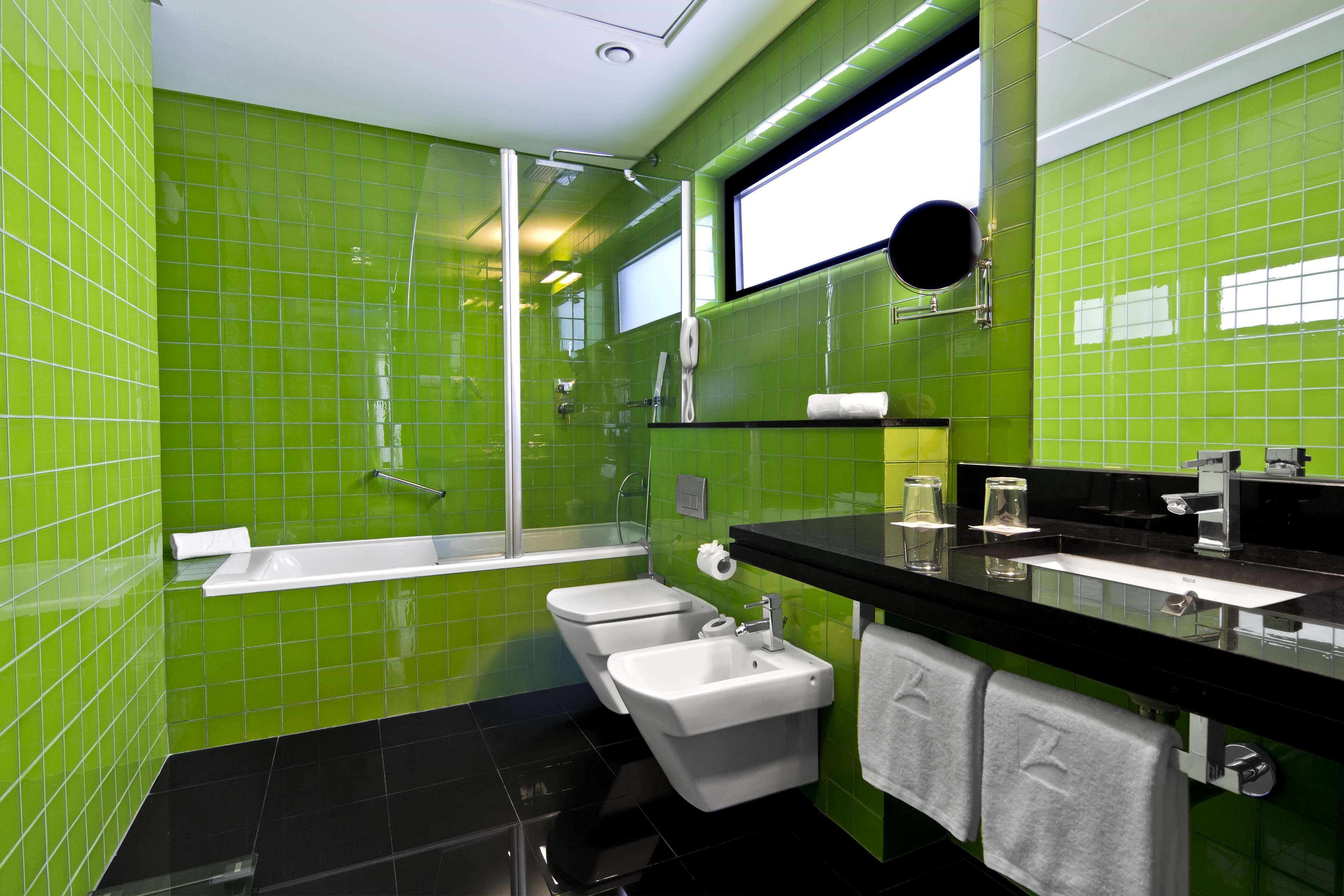 superior double room | bathroom | eco-friendly toiletries, hair dryer, bathrobes, bidet