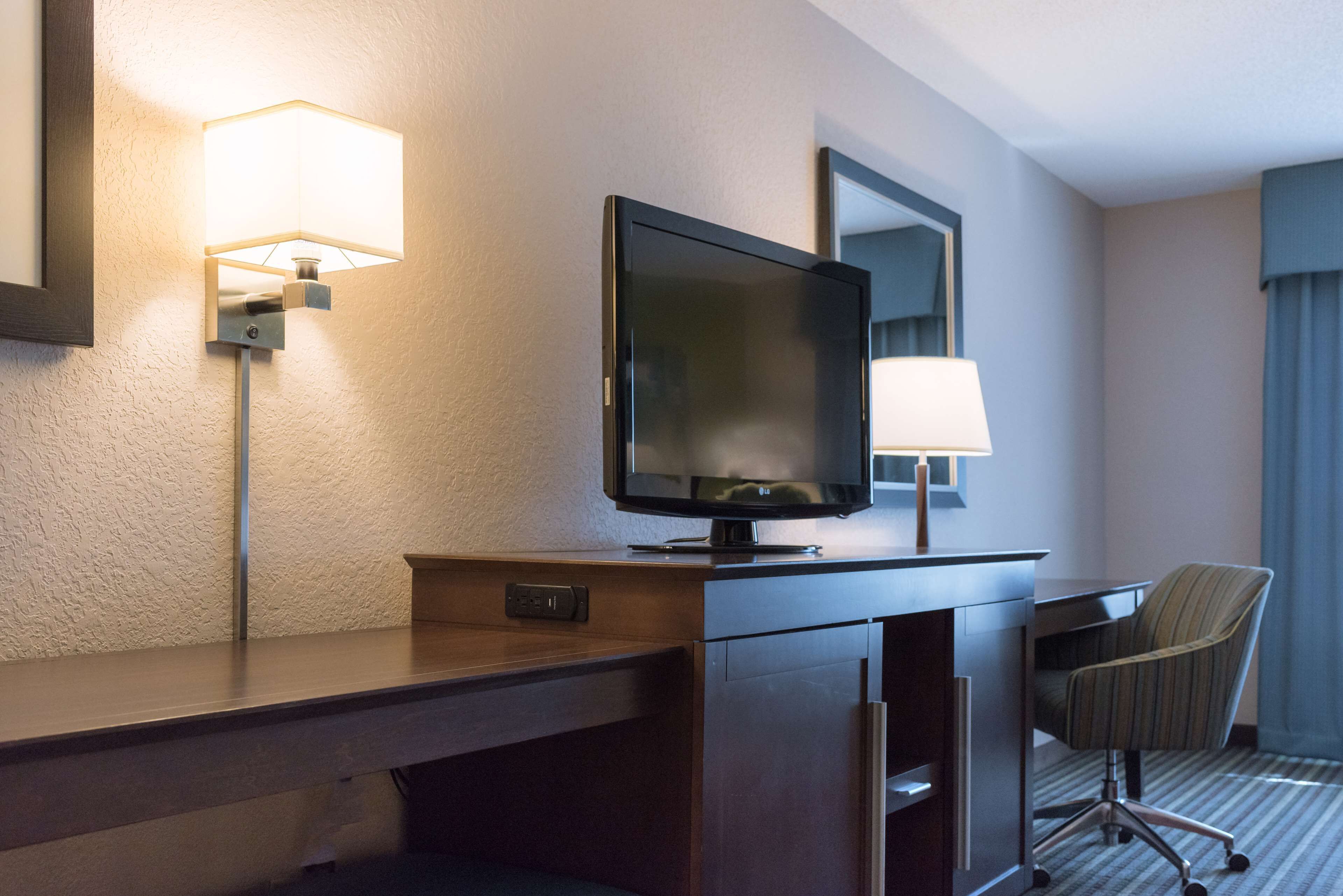 deluxe room, 2 queen beds, non smoking | in-room safe, desk, blackout curtains, iron/ironing board