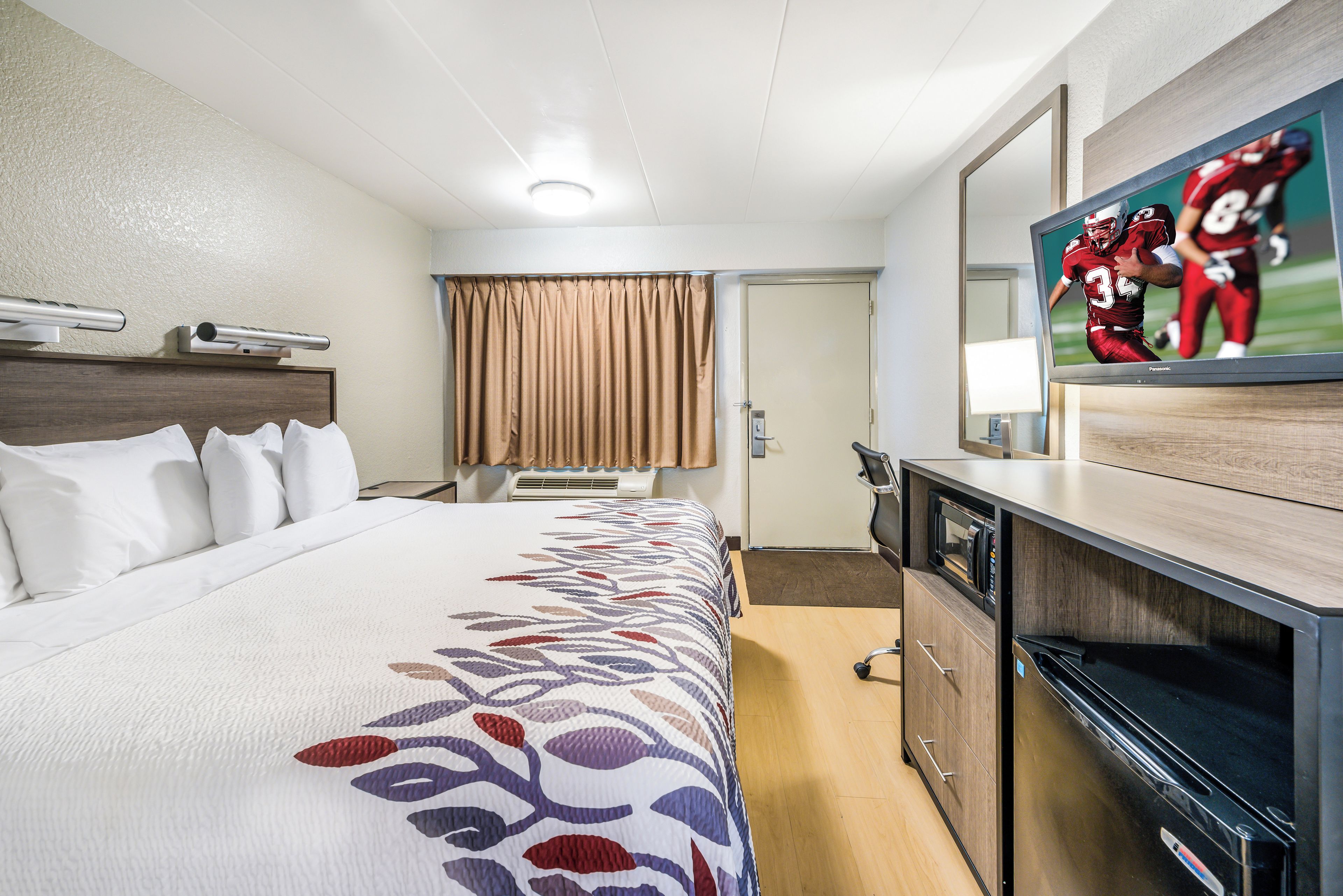 Deluxe Room, 1 King Bed (Smoke Free) | Desk, blackout curtains, free cots/infant beds, free WiFi
