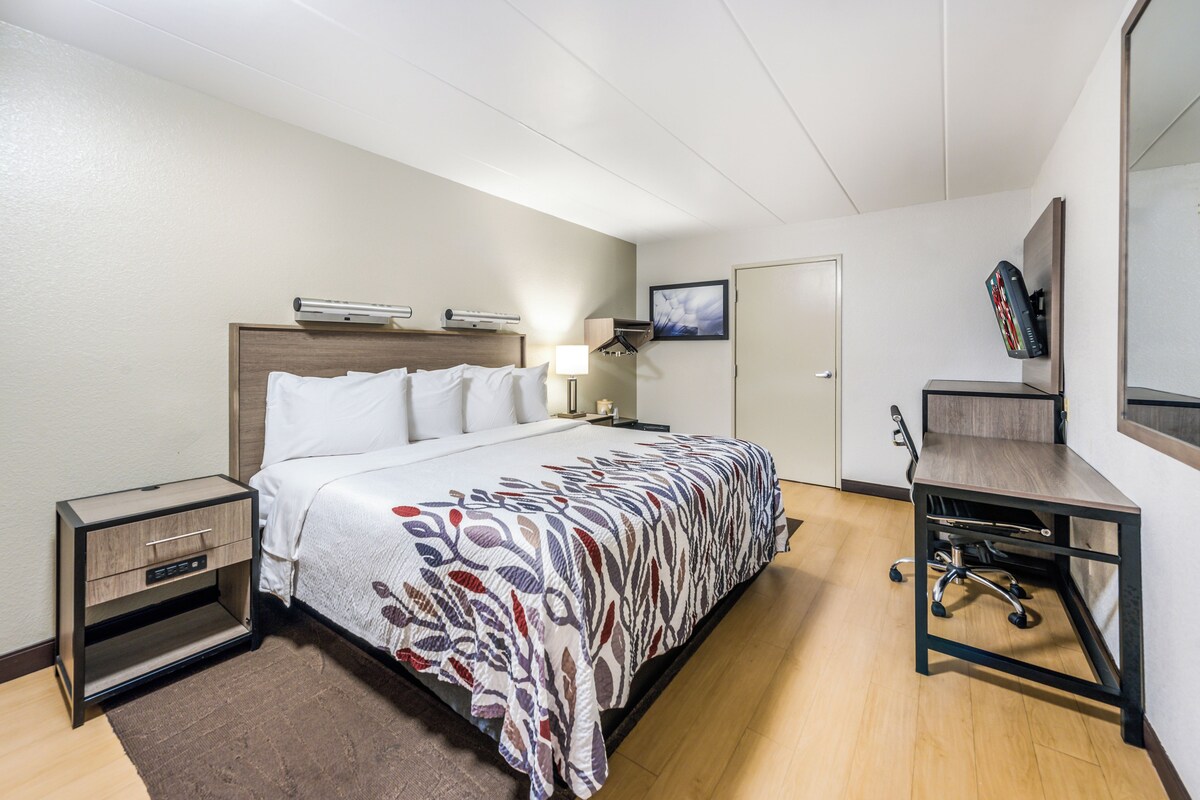 Desk, blackout drapes, cribs (free), WiFi (free)