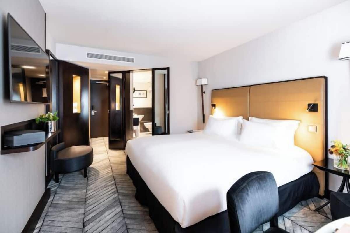 1 kamar tidur, seprai premium, minibar, dan brankas