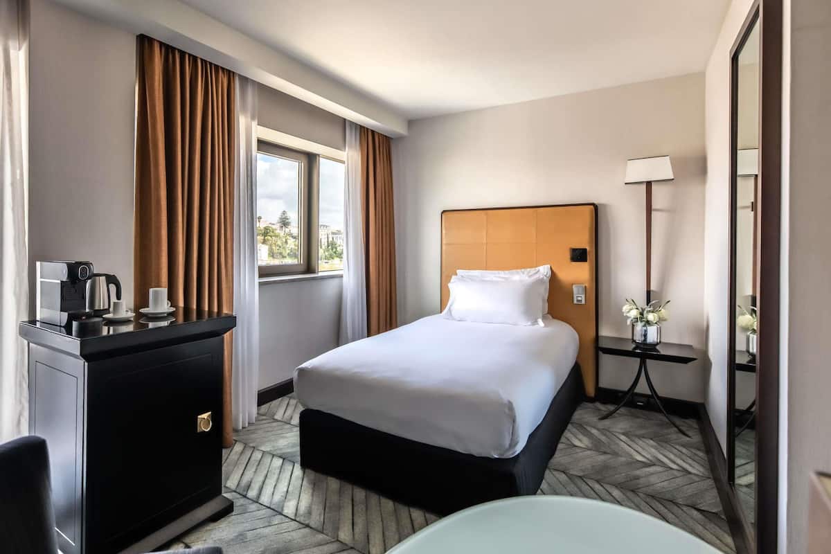 Chambre classique, 1 lit jumeau | Literie de qualité, minibar, coffre-fort pour ordinateur portable