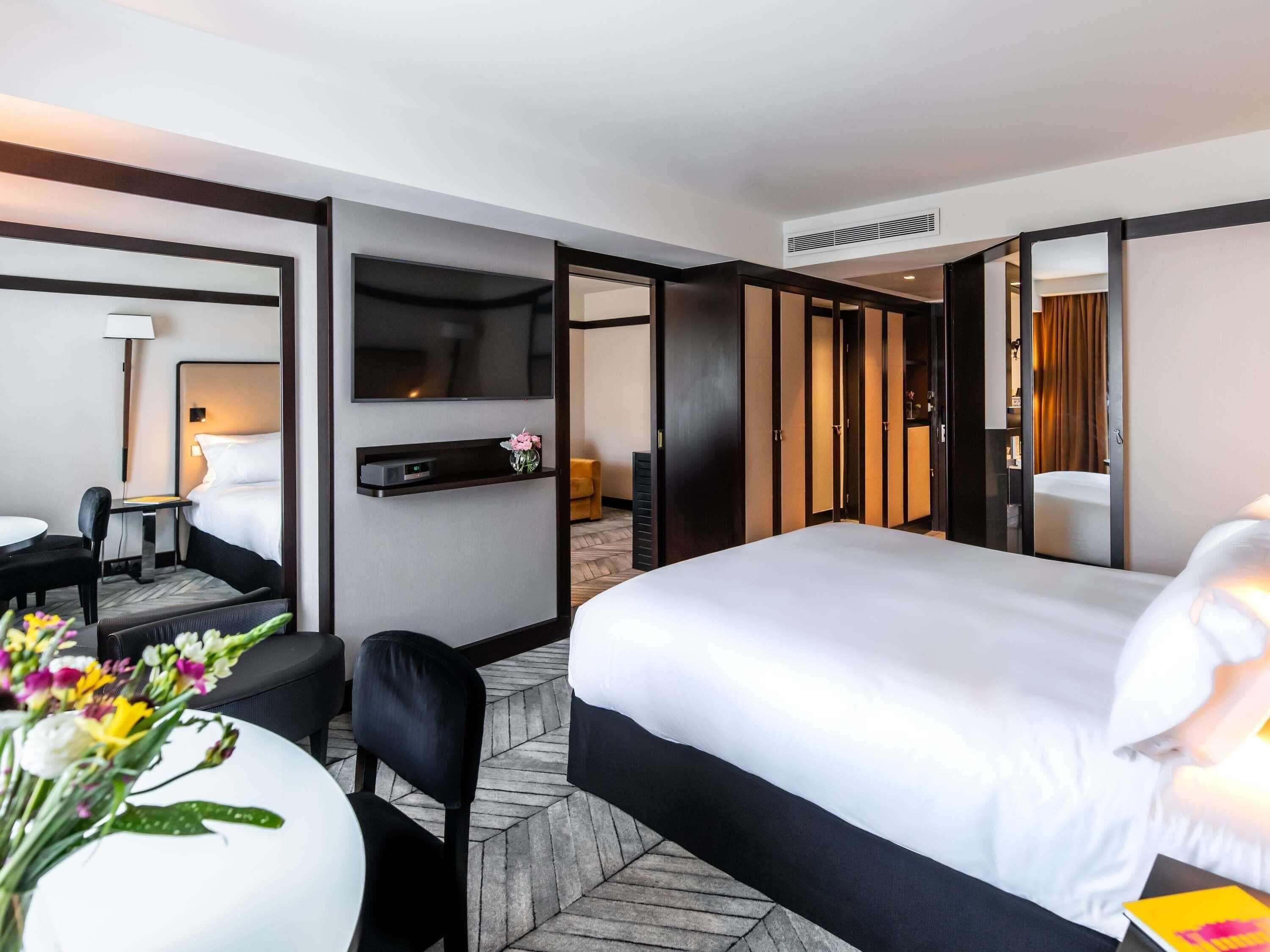 Suíte júnior, 1 cama King | Roupas de cama premium, frigobar, cofres nos quartos, escrivaninha