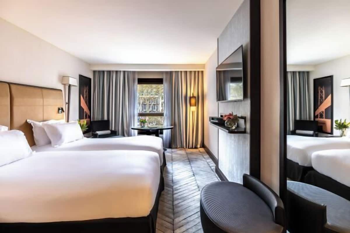 1 kamar tidur, seprai premium, minibar, dan brankas