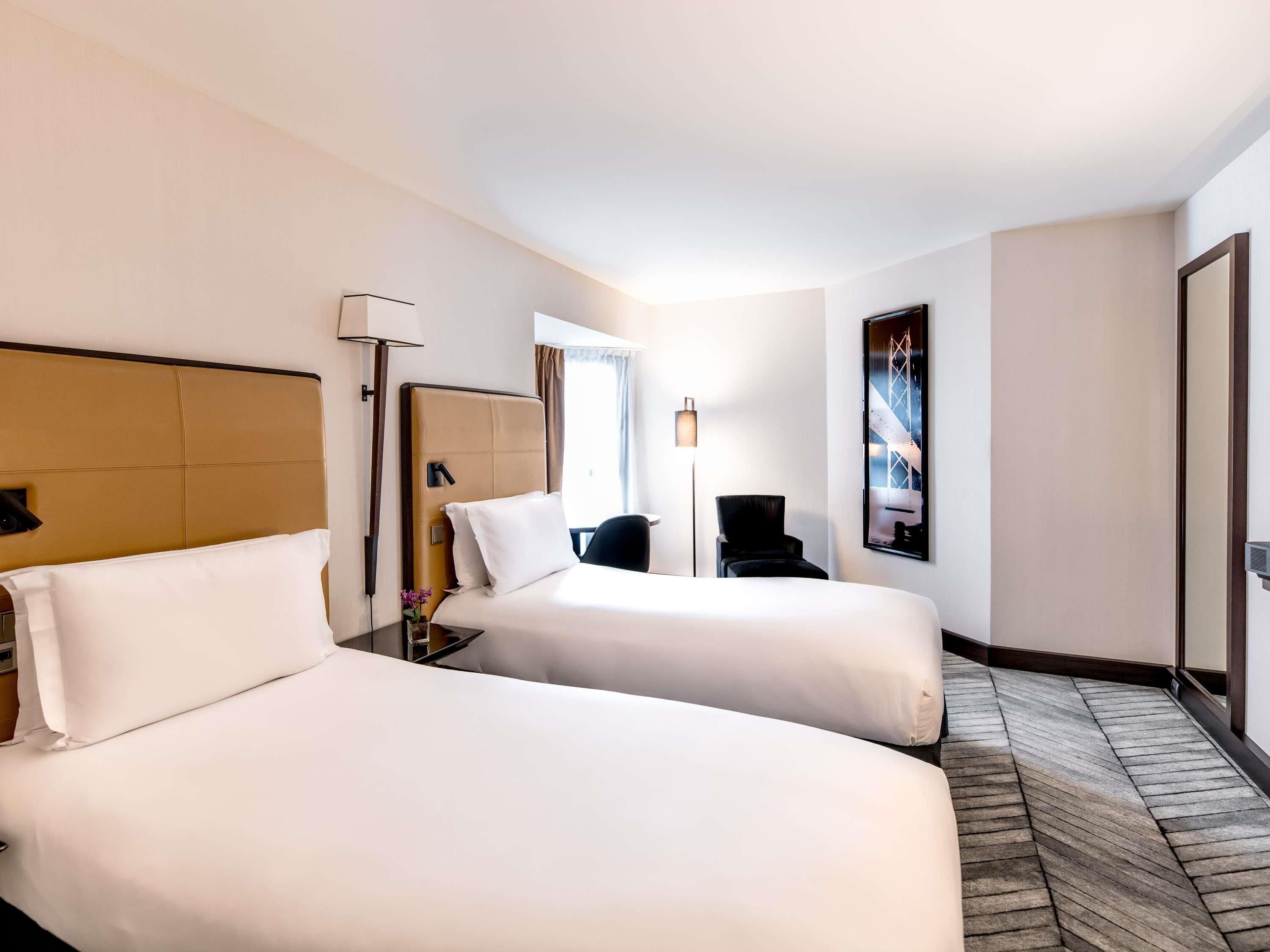 Luxe kamer, 2 eenpersoonsbedden | Luxe beddengoed, een minibar, een kluis op de kamer, een bureau