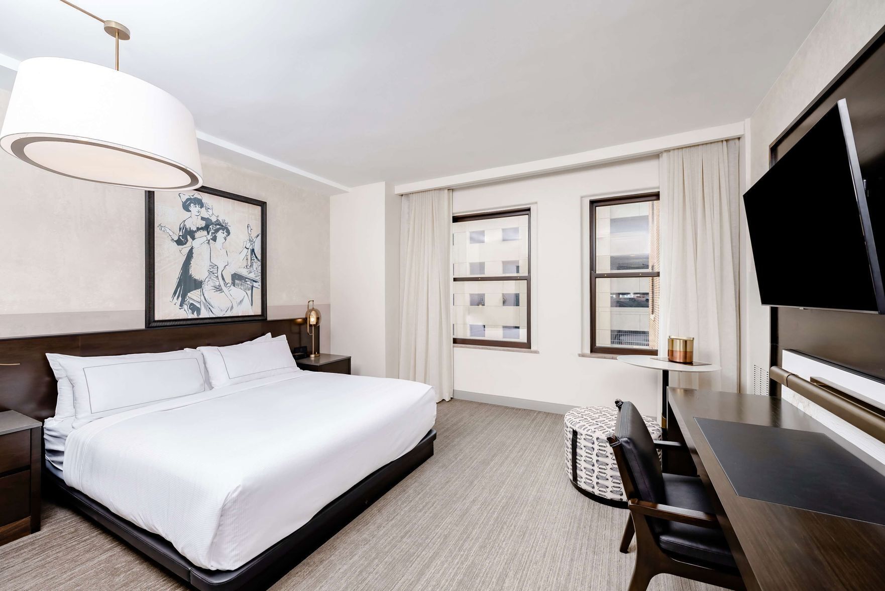 Premium bedding, desk, laptop workspace, iron/ironing board