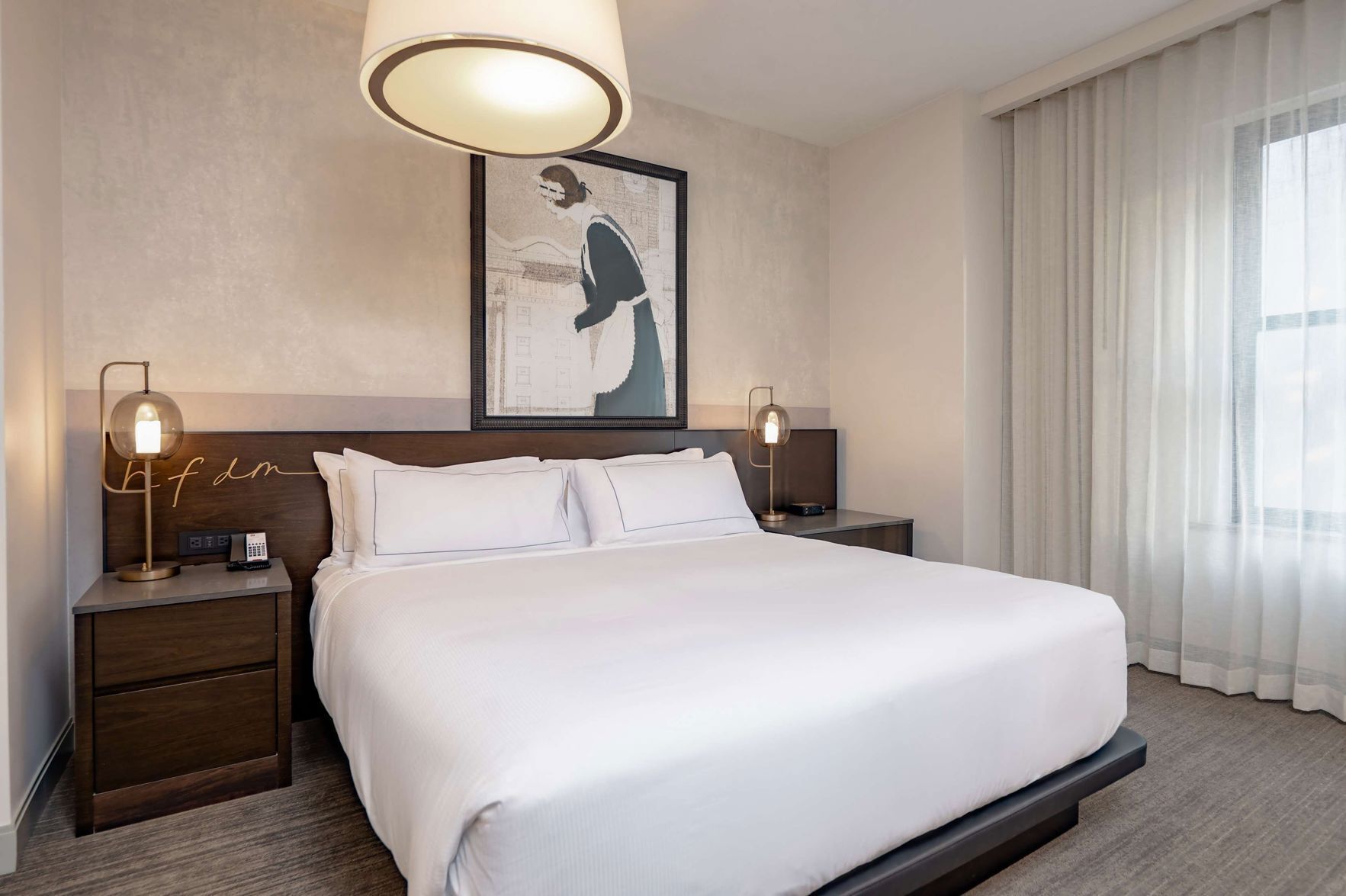 Premium bedding, desk, laptop workspace, iron/ironing board