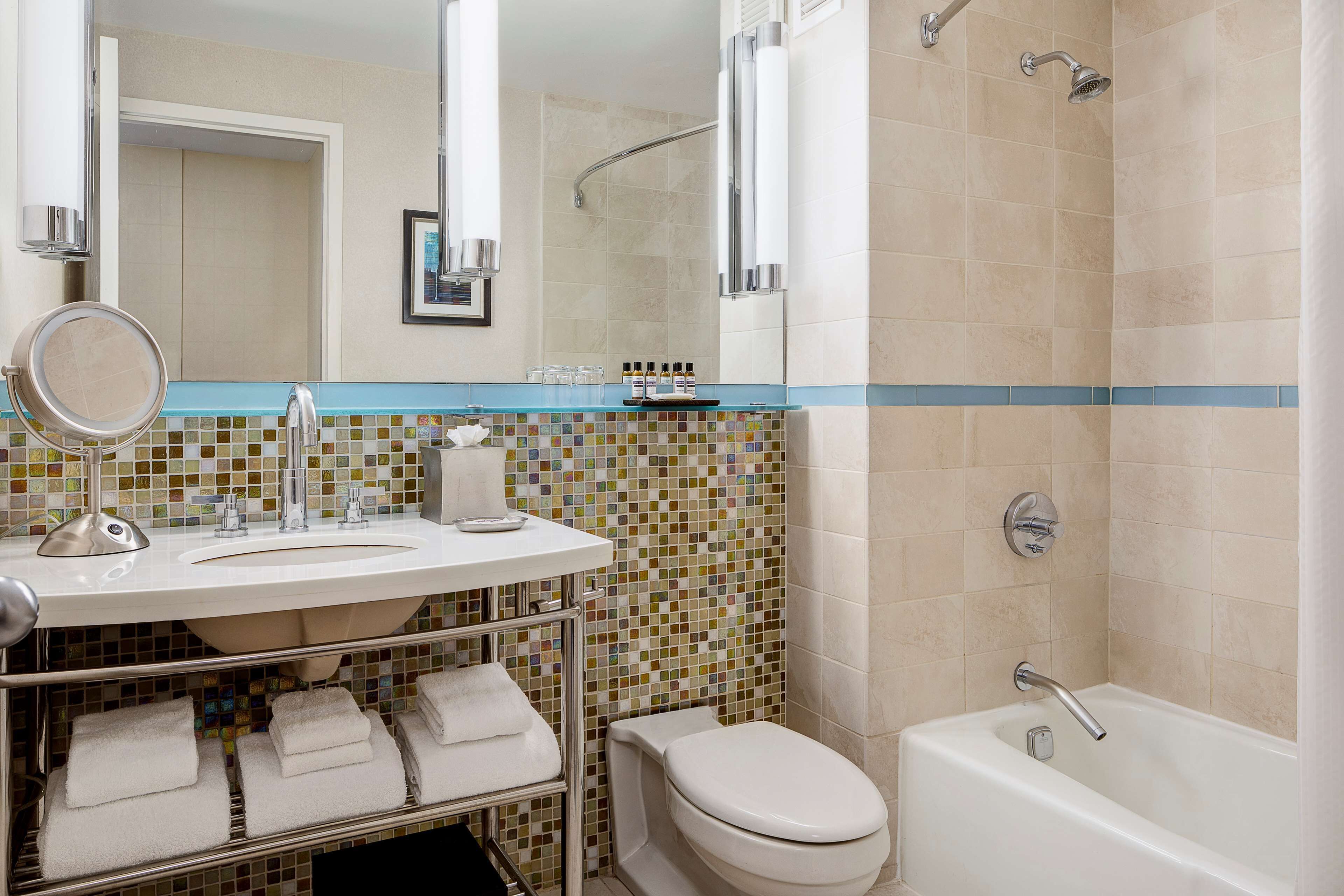 eco-friendly toiletries, hair dryer, towels, soap