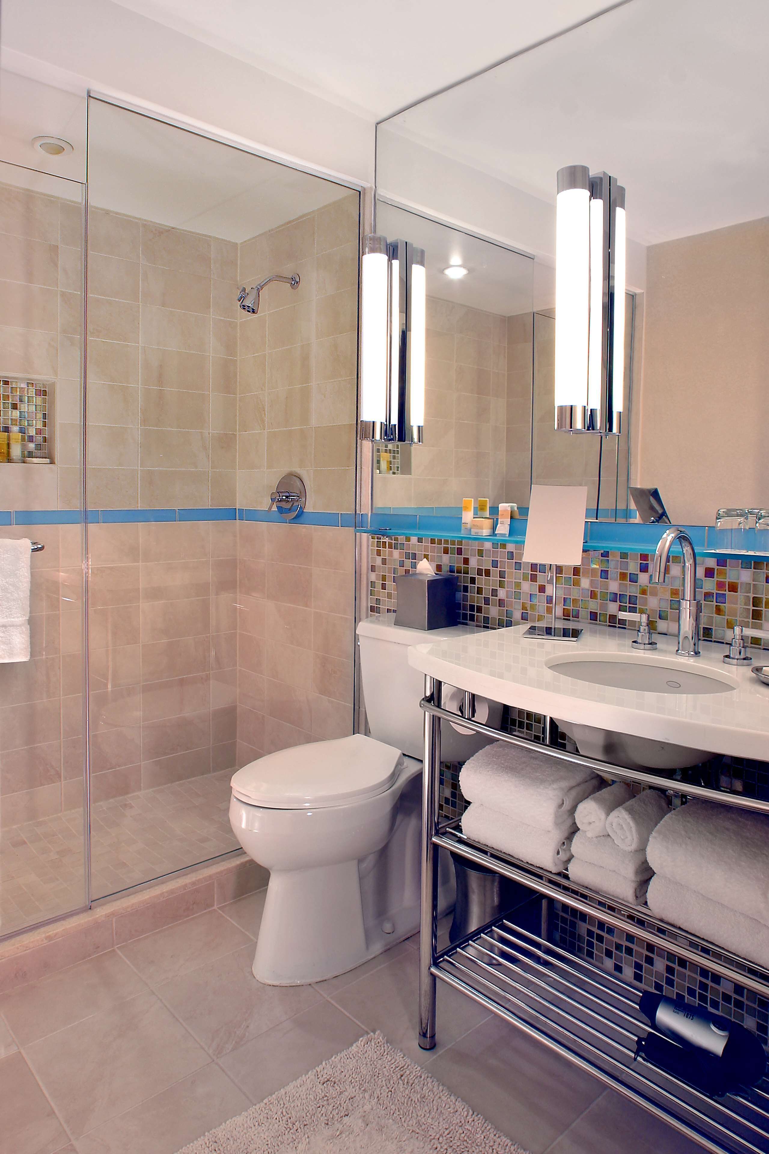 eco-friendly toiletries, hair dryer, towels, soap