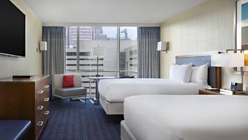 Hypo-allergenic bedding, down duvets, in-room safe