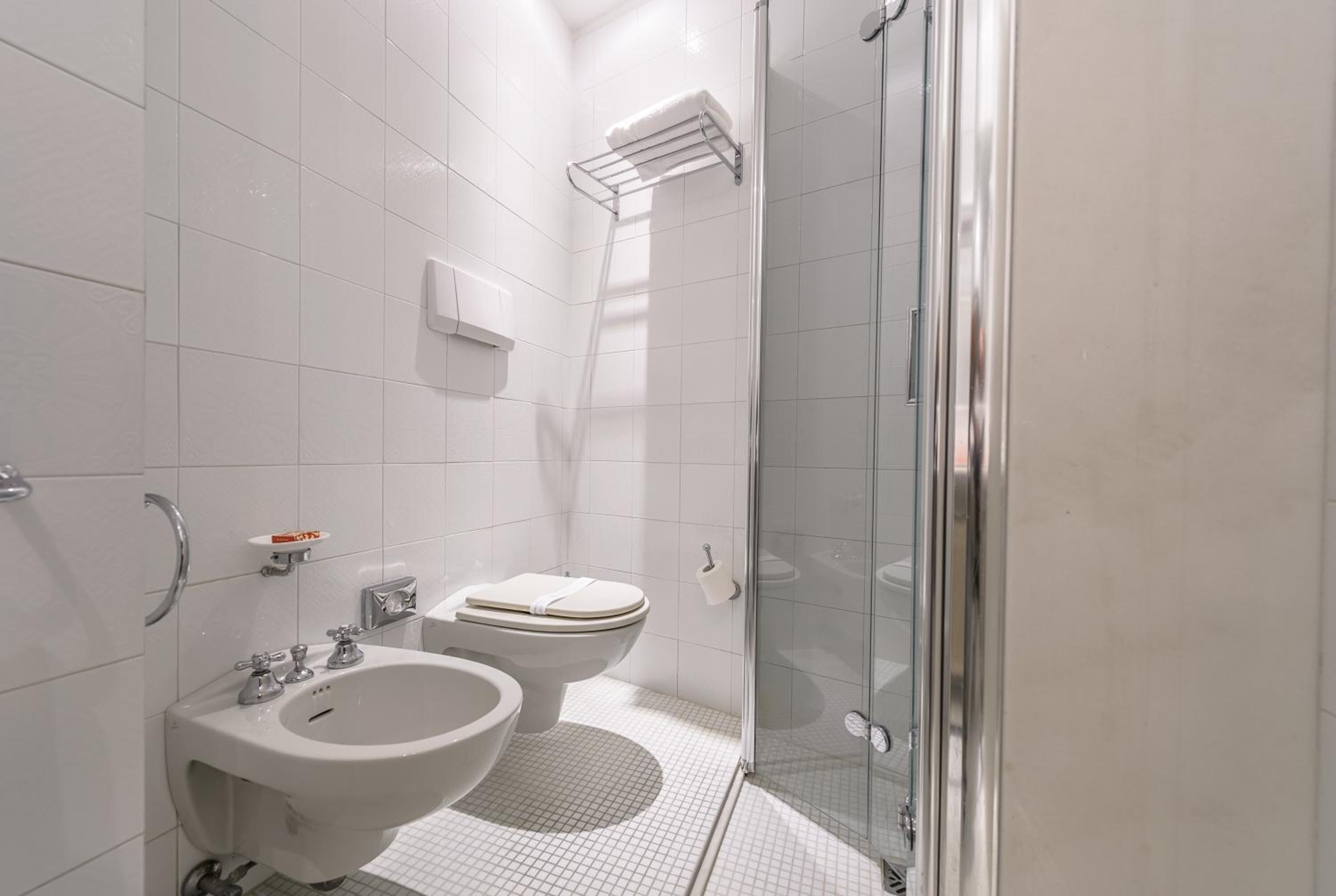 free toiletries, hair dryer, bidet, towels